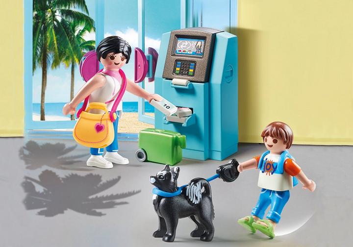 Tourists with ATM